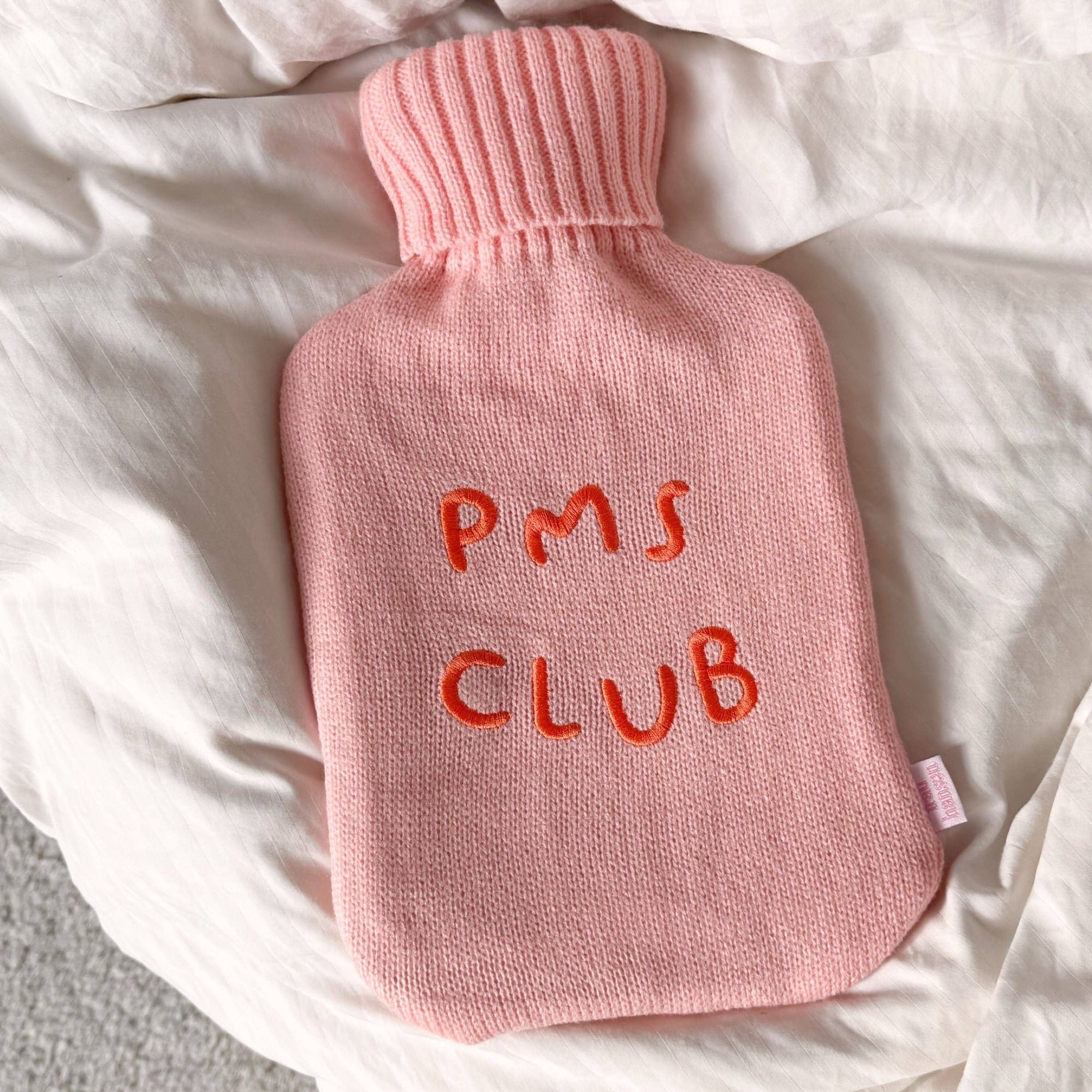 Wärmflasche Statement PMS Club