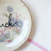 Vintage Wandteller „fuck" – handbemalte Statement-Wanddeko aus Porzellan