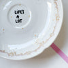 Vintage Wandteller "LIFE´S A LOT" – handbemalte Statement-Wanddeko aus Porzellan