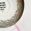 Vintage Wandteller "YOU ARE THE BEST.FUCK THE REST." – handbemalte Statement-Wanddeko aus Porzellan