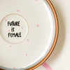 Vintage Wandteller "FUTURE IS FEMALE" – handbemalte Statement-Wanddeko aus Porzellan